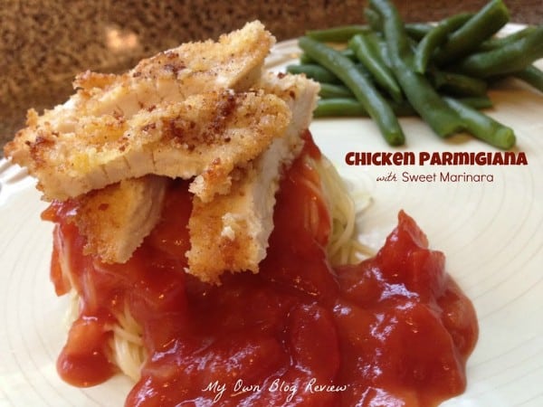 Chicken Parmigiana with Sweet Marinara sauce is delicious, homemade and easy. You will love this and it will quickly become a family favorite! www.embellishmints.com