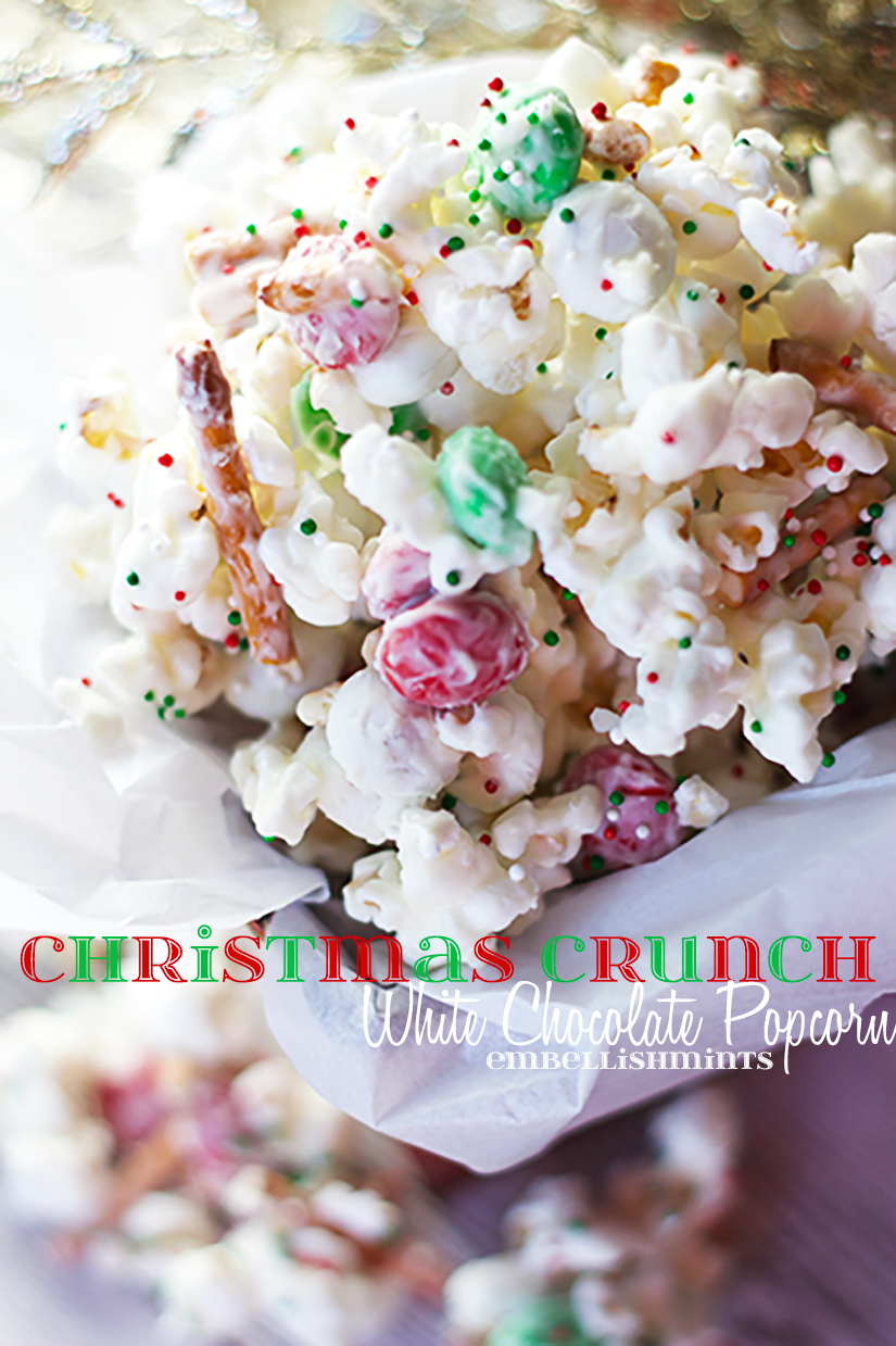 Christmas Crunch White Chocolate Popcorn is so easy to make and it's dangerously good!! It's a great homemade gift for friends and family. Quick, easy and delicious! www.Embellishmints.com