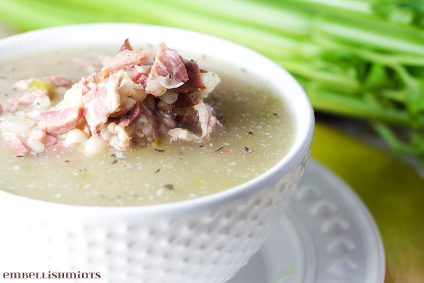 This Ham and Bean Soup Recipe is perfect for leftover ham any time of year! It's a delicious low-fat soup full of flavor! www.Embellishmints.com