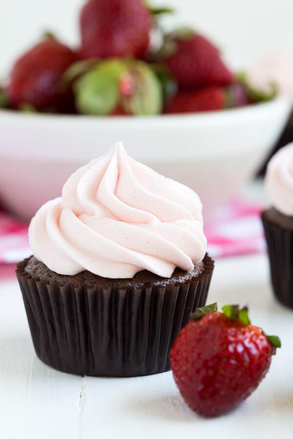 Chocolate Cupcakes with Strawberry Marshmallow Frosting are delicious. I love how the soft pink frosting pops next to the decadent chocolate cupcakes! Find the link on www.Embellishmints.com