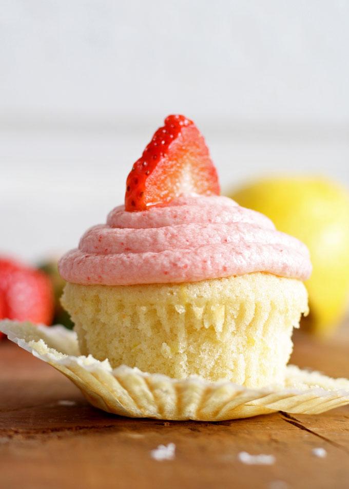 STRAWBERRY LEMONADE CUPCAKES. These are so delicious and always make a statement at a party or get together. You must save this Strawberry Lemonade Cupcakes recipe, find the link on Embellishmints.com
