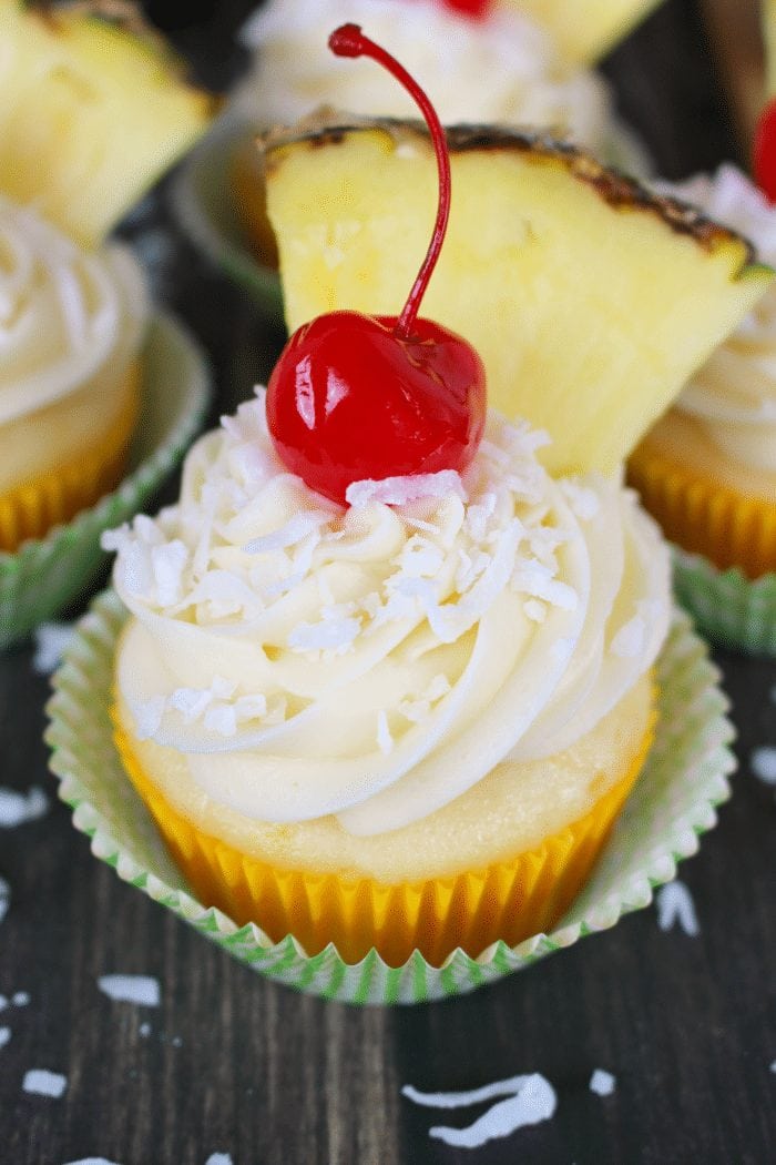 Pina Colada Cupcakes recipe from DelightfulEMade on this week's linky party on Embellishmints.com