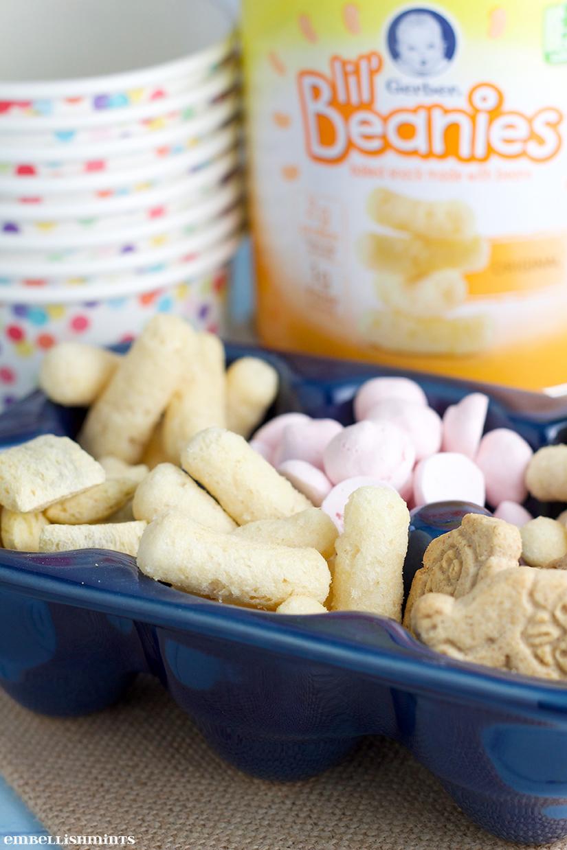 Snacks For Toddlers using Gerber's Lil' Beanies. Here's to a little DIY trail-mix for your picky toddler! Find out what you'll need on www.Embellishmints.com