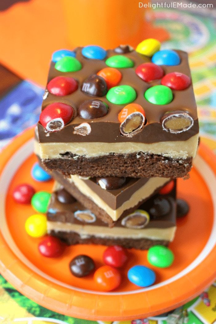 This week's Linky Party favorite dessert recipes are these Peanut Butter Brownie Bars from DelightfulEMade. Rich, fudgy brownies are layered with peanut butter filling, a chocolate peanut butter ganache and topped with Peanut Butter M&M's® candies!